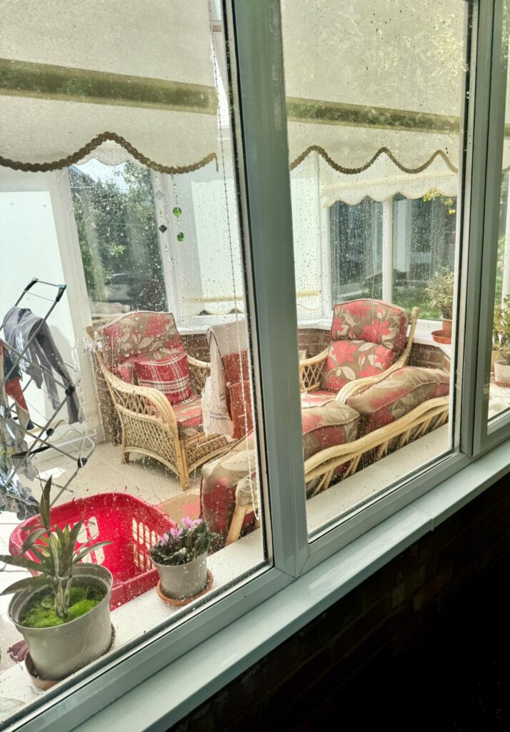 Dirty conservatory window before cleaning